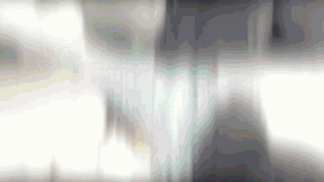 a gray and white background with a few lines of light