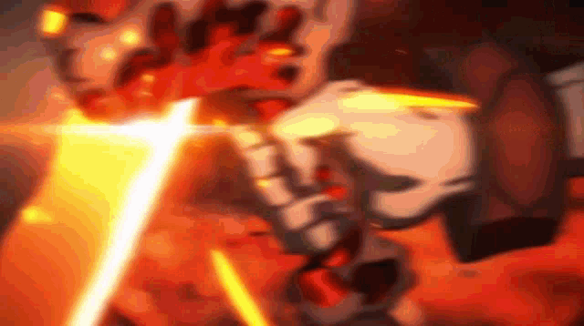 a close up of a person 's hand holding a sword with a glowing light coming out of it .