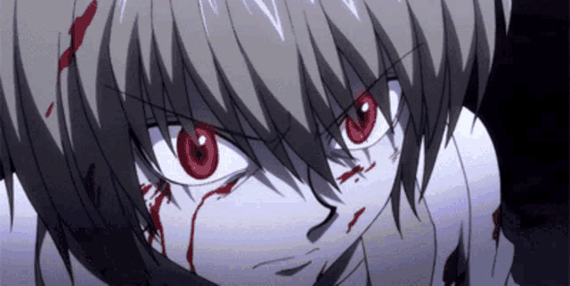 a close up of a person 's face with blood on it