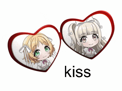 two heart shaped mirrors with the word kiss underneath