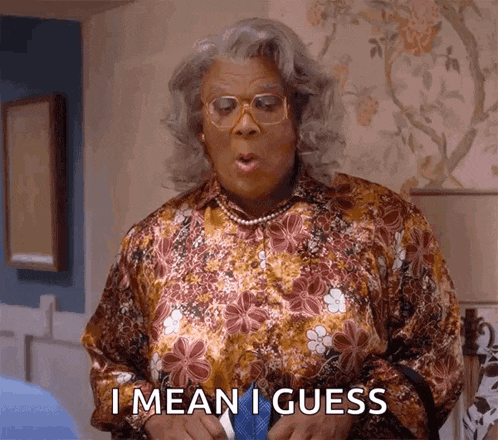 a woman says i mean i guess in a floral shirt