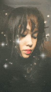 a picture of a girl with red lipstick and a gray background