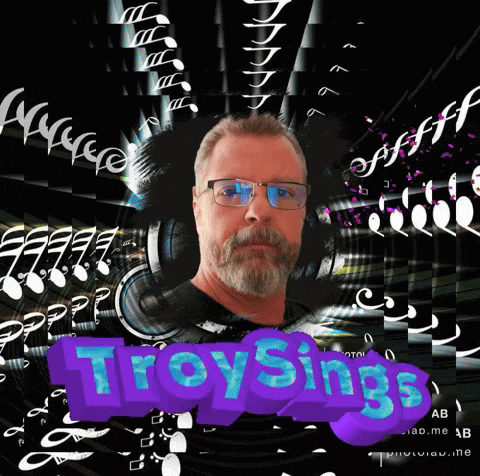 a man with glasses and a beard is surrounded by music notes and the words troy sings in blue