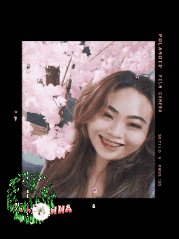 a polaroid film camera shows a woman smiling
