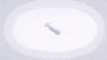 a tube of toothpaste with purple smoke coming out