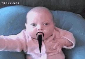 a baby with a fake mustache is on a blue pillow with gifak.net written on the bottom
