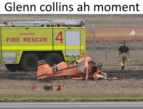 a yellow aviation fire rescue truck with the number four on it