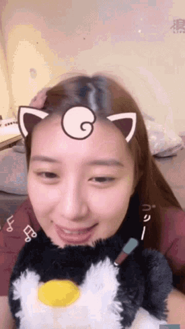 a woman with a cat ear on her head