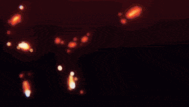 a dark background with a few glowing lines