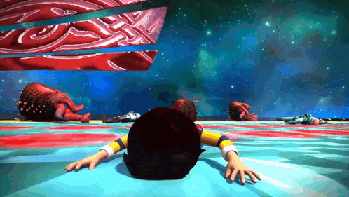 a cartoon character is laying on the ground in front of a giant red object