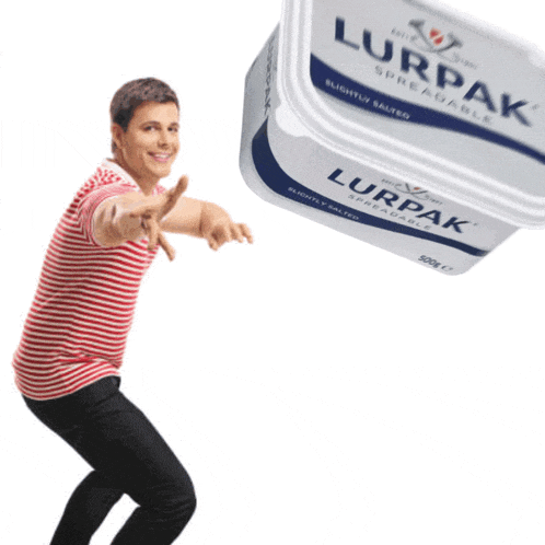 a man is standing next to a container of lurpak