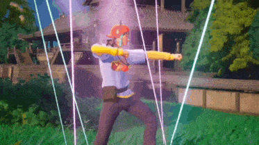 a man in a blue shirt is standing in a field holding a sword