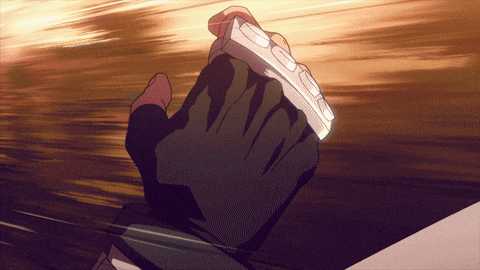 a close up of a person 's hand holding a white object