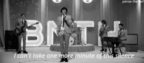 a black and white photo of a band with the words i can 't take one more minute of this silence below them