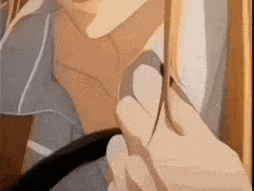 a close up of a person 's neck with a black belt .