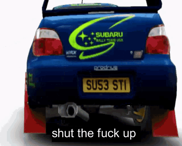 a blue subaru rally team usa car with the words shut the fuck up on the bottom
