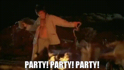 a man is dancing in front of a fire with the words party party party written above him .