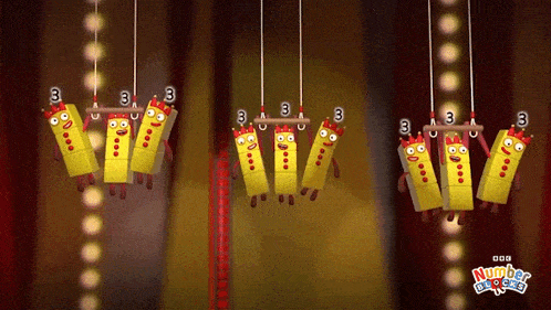 a group of number blocks are hanging from a rope with the number 3 on them