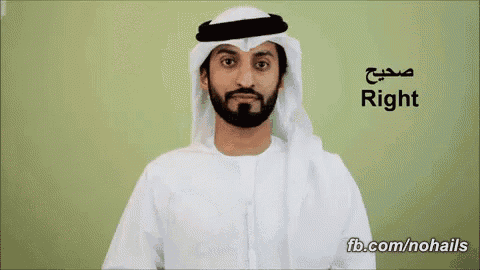 a man with a beard is wearing a white shirt and a white scarf with the word right written on it
