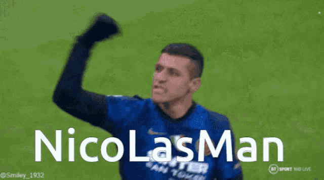 a man in a blue shirt with the name nicolas man written on it