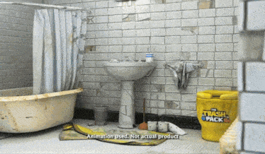 a bathroom with a bucket that says " the trash pack "