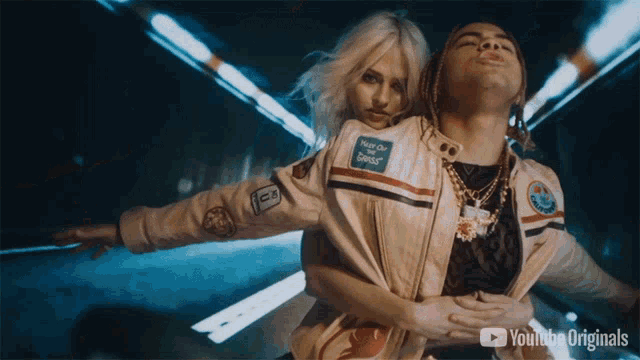 a youtube originals ad shows a man and woman dancing