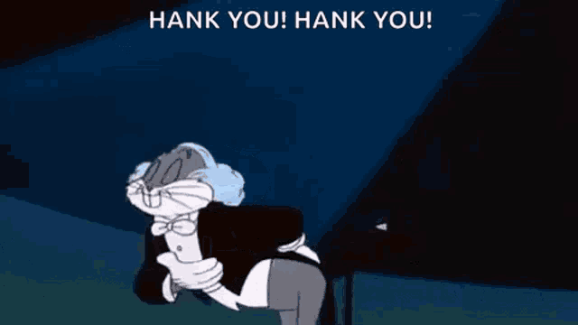 bugs bunny is wearing a tuxedo and bow tie and saying `` hank you hank you '' .