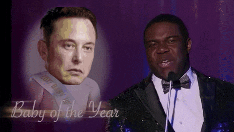 a man in a tuxedo speaking into a microphone next to a picture of elon musk