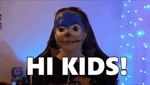 a girl with a sonic mask on her face is saying hi kids !
