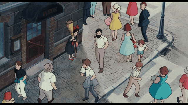 a group of people are walking down a street in front of a building that has the word fischi on it