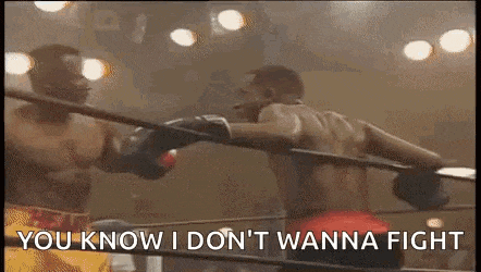 two men are boxing in a ring and one of them is saying `` you know i don 't wanna fight ''