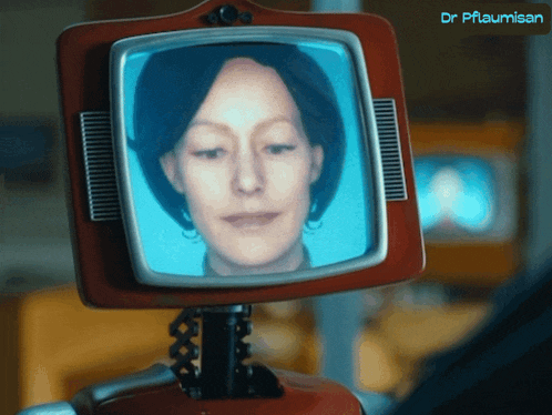 a screen with a woman 's face on it and the name dr pflaumisan on the bottom right