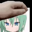 a hand is holding a green haired anime girl 's head in front of a white background .