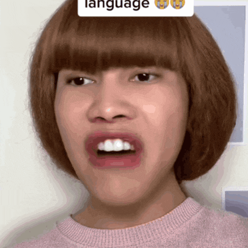 a close up of a person 's face with the word language on the bottom right