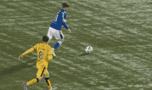 a soccer player wearing a blue jersey with the number 9 on it