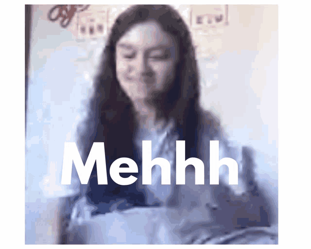 a picture of a girl with the word mehhh written above her