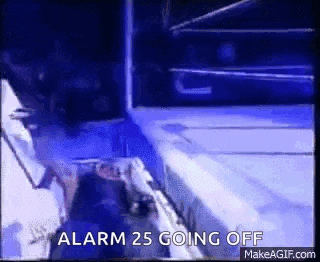 a wrestling ring with the words alarm 25 going off written on it