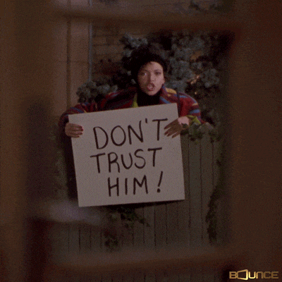 a person holding a sign that says " watch out girl "