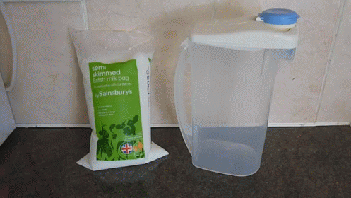 Milk... In A Bag? GIF - Canada Jug Container GIFs