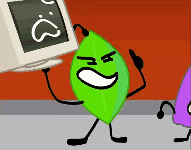 a green leaf with arms and legs is standing next to a computer monitor with a sad face on it .