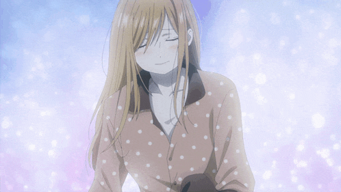 a close up of a girl with her eyes closed and her hair blowing in the wind