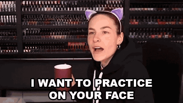a woman wearing cat ears and a headband says i want to practice on your face
