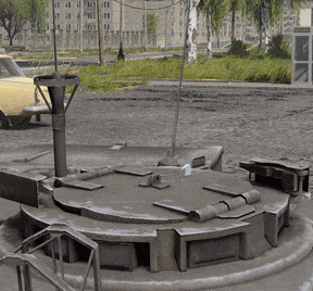 a yellow car is parked in a parking lot next to a large round object