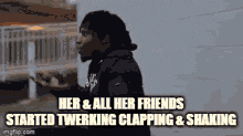 a man standing in front of a building with the words " her & all her friends started twerking clapping & shaking " above him