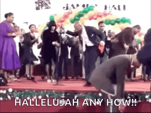 a group of people are dancing on a stage with the words hallelujah any how