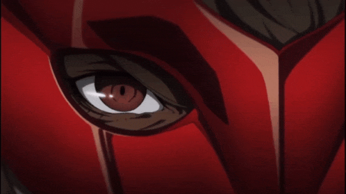 a close up of a person 's eye with a red mask