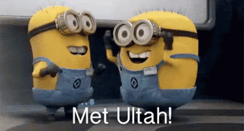 two minions are standing next to each other with the words met ultah in the corner
