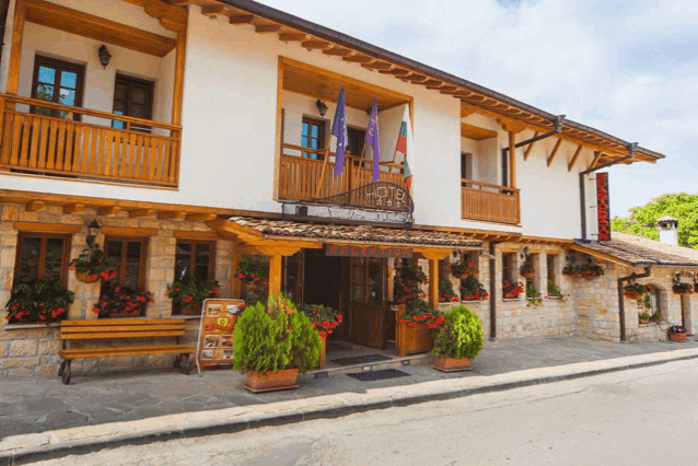 the front of a hotel with a sign that says " reception "