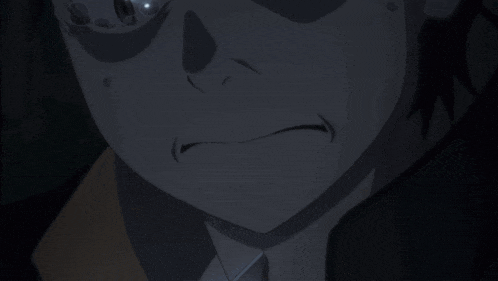a close up of a person 's face with tears running down his face