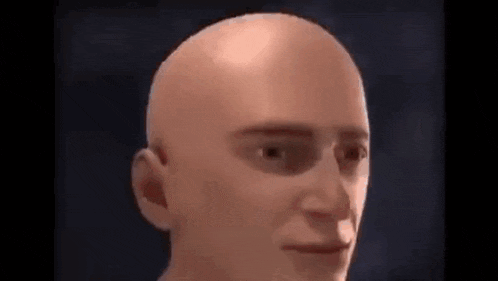 a close up of a bald man 's face with a smile on his face .